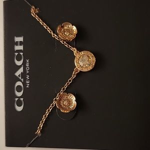 Coach rose gold earrings and necklace set